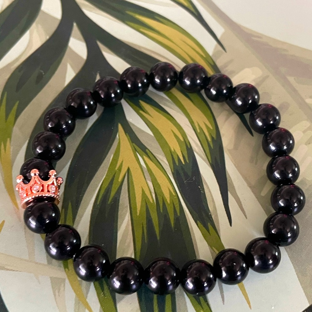 Obsidian stone with Crown charm
